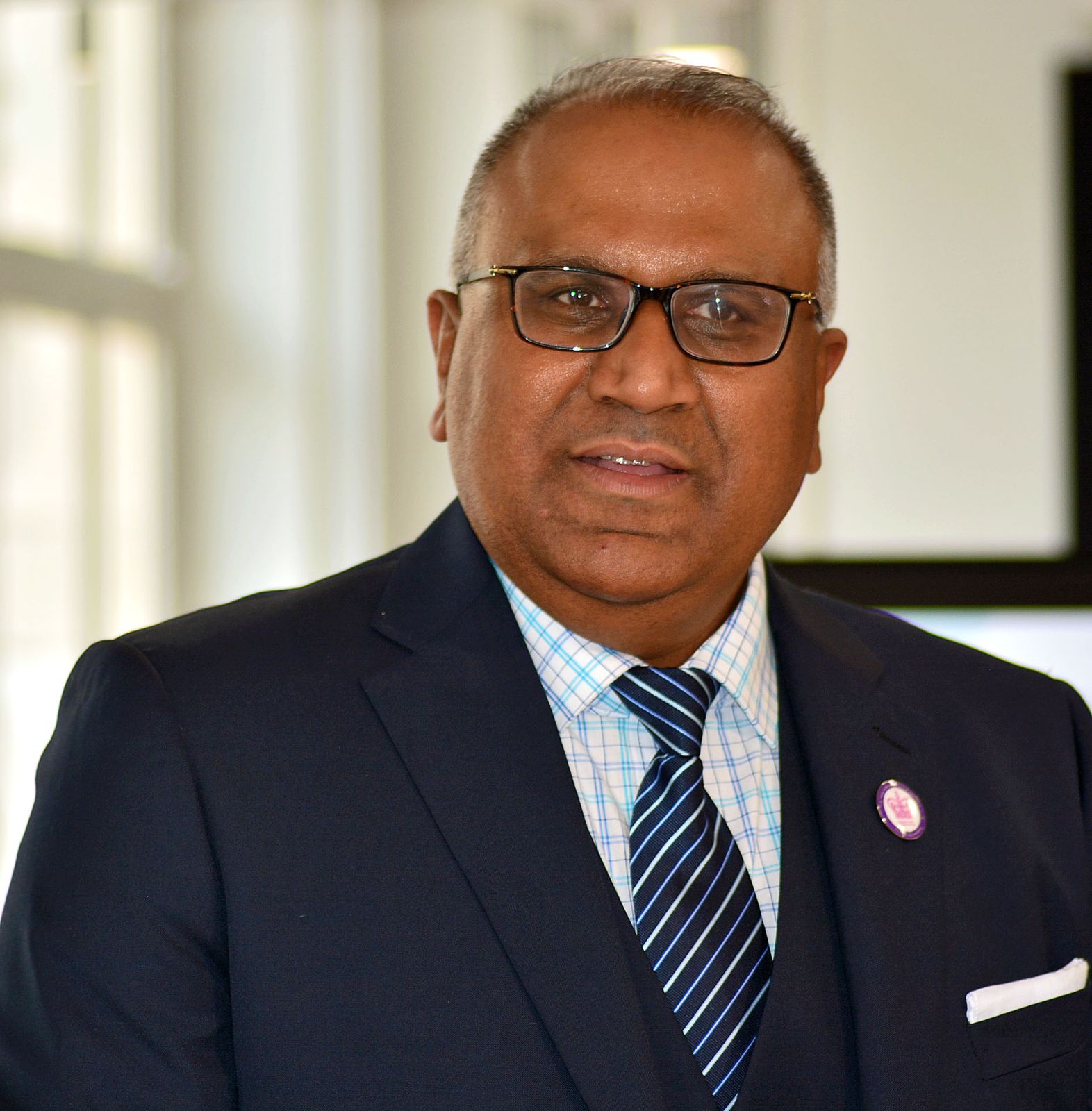 Safaraz Ali MBE speaking at a business event