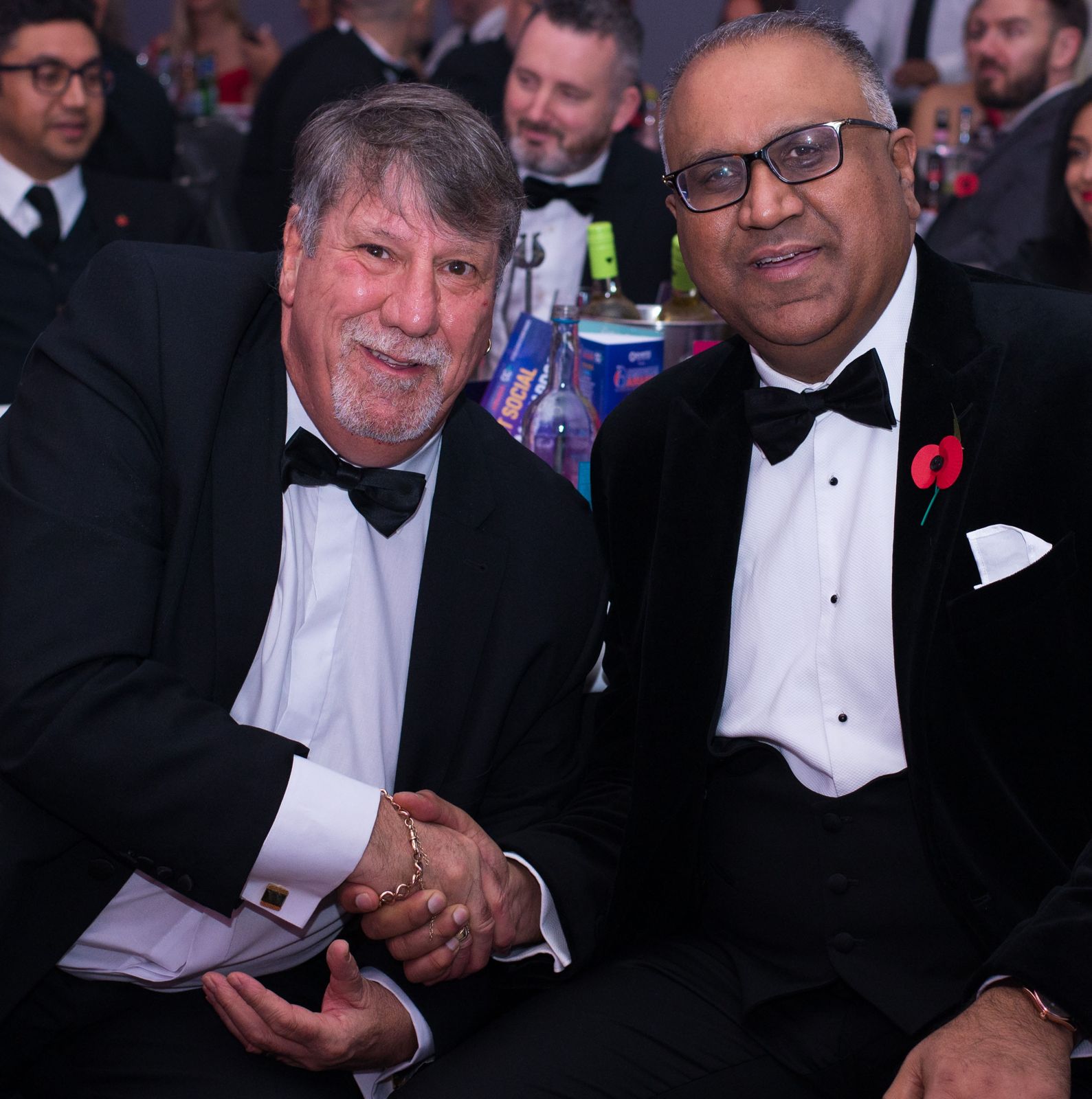 Safaraz Ali MBE with a fellow guest at a gala dinner