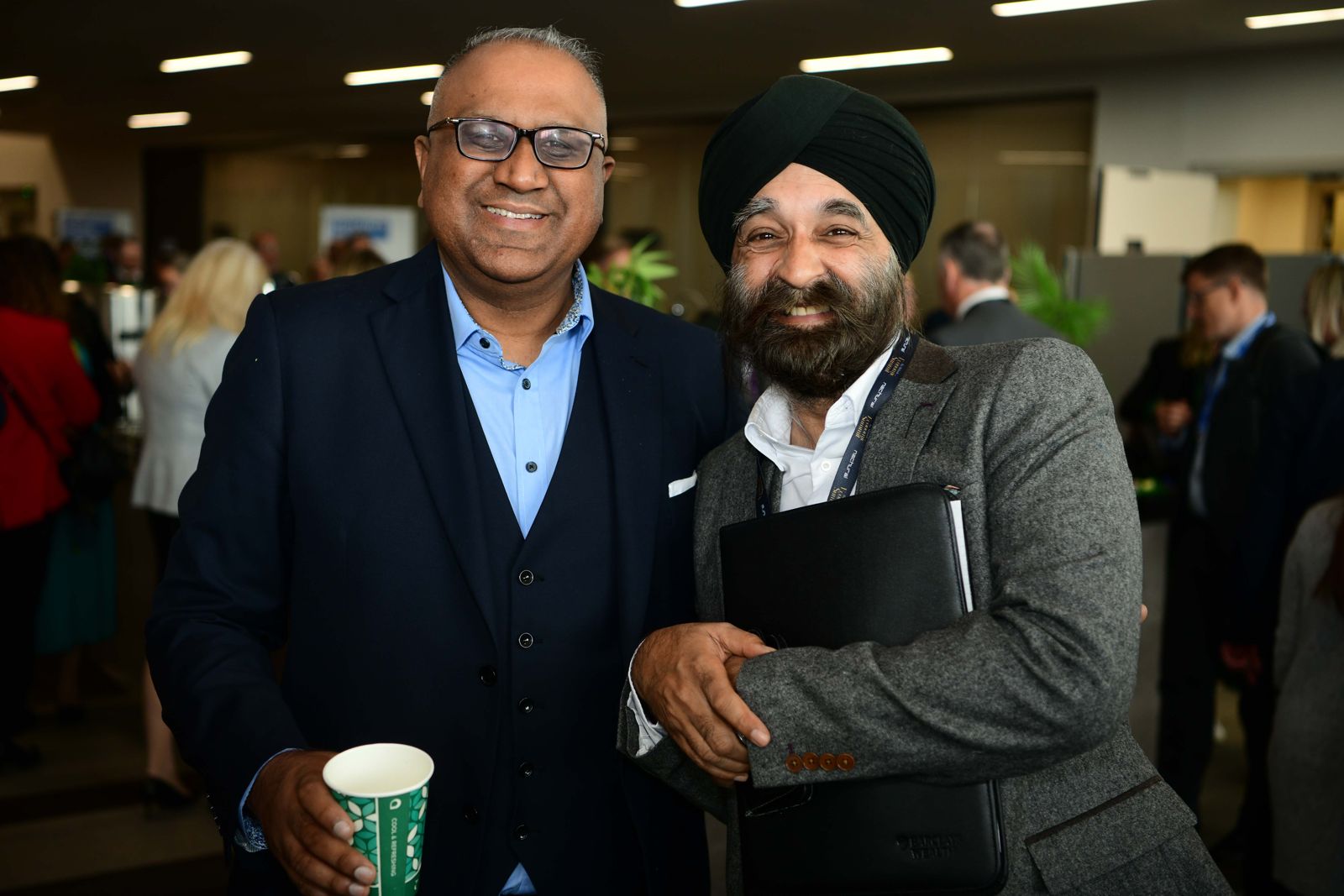 Safaraz Ali MBE with a colleague at a networking event