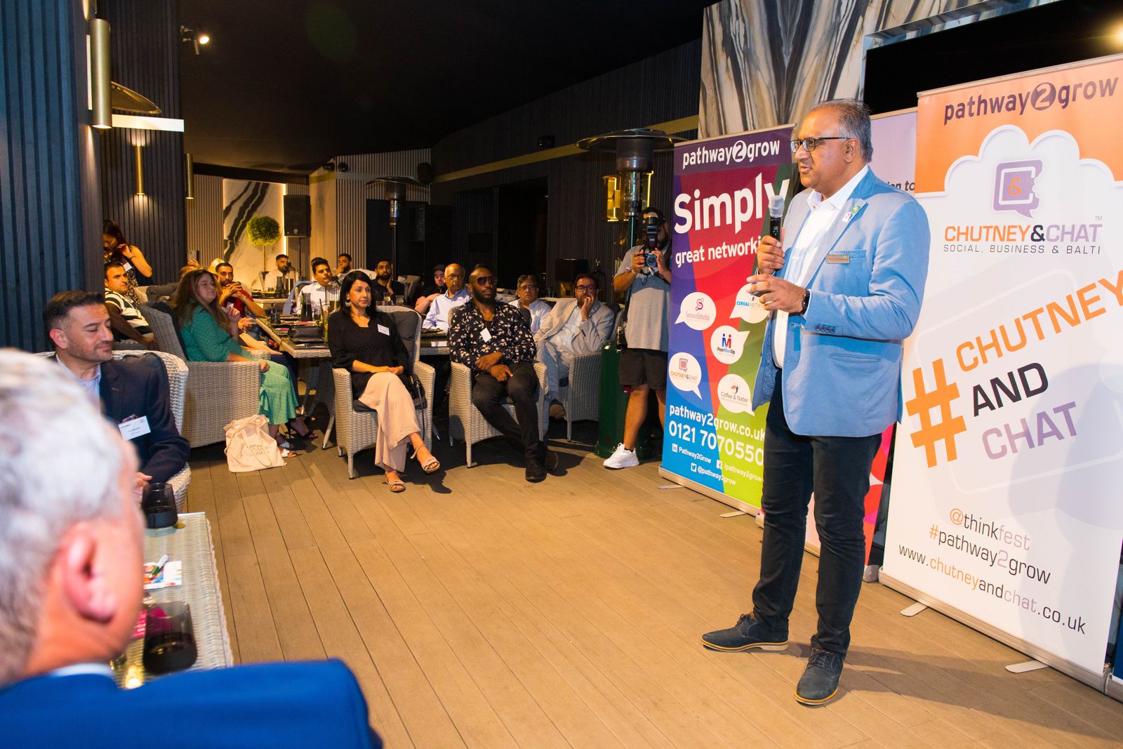 Safaraz Ali MBE speaking at a networking event