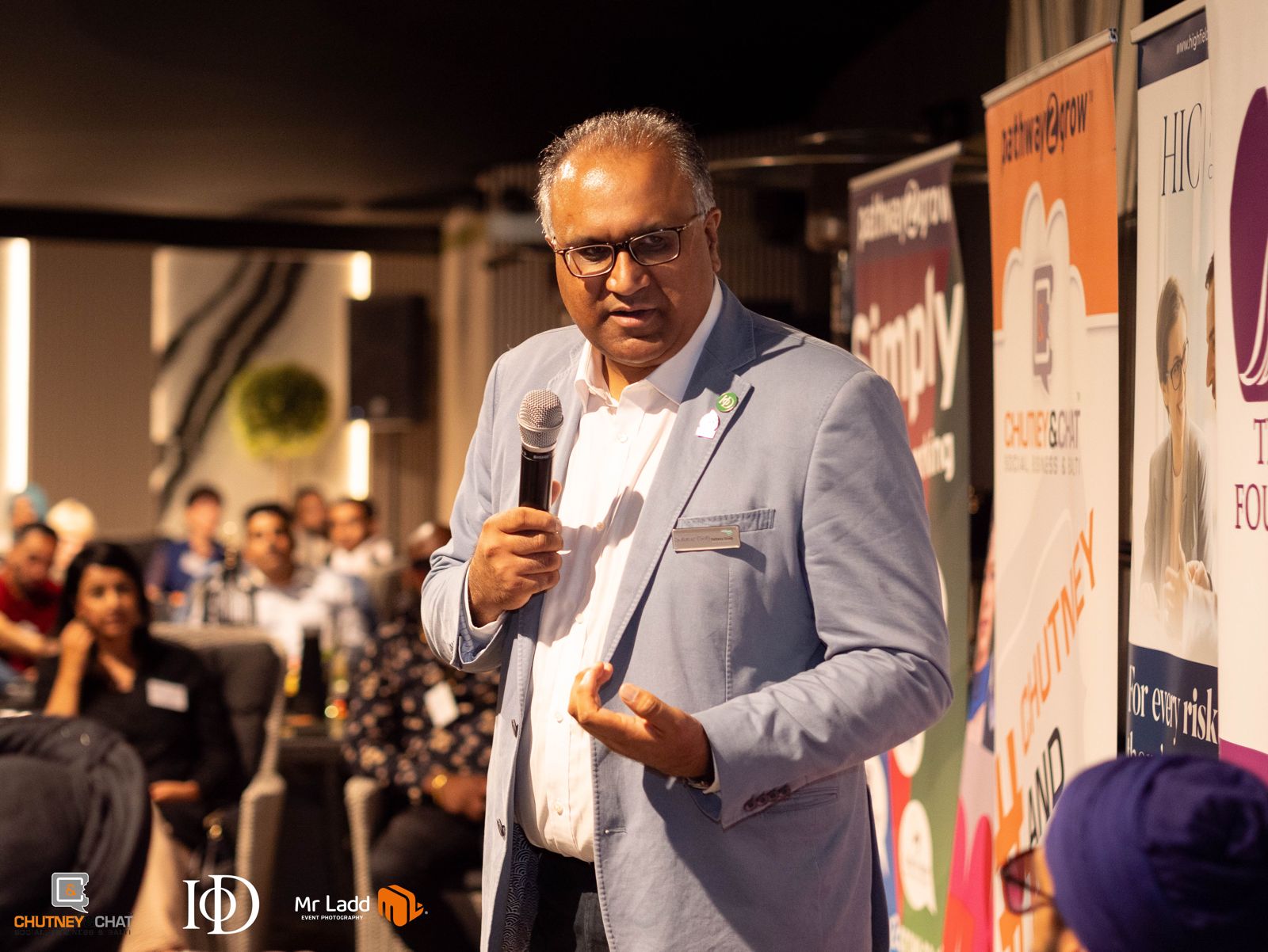 Safaraz Ali MBE speaking at a networking event