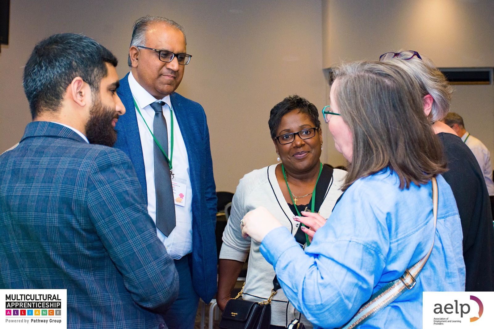 Safaraz Ali MBE meeting delegates at an apprenticeship event