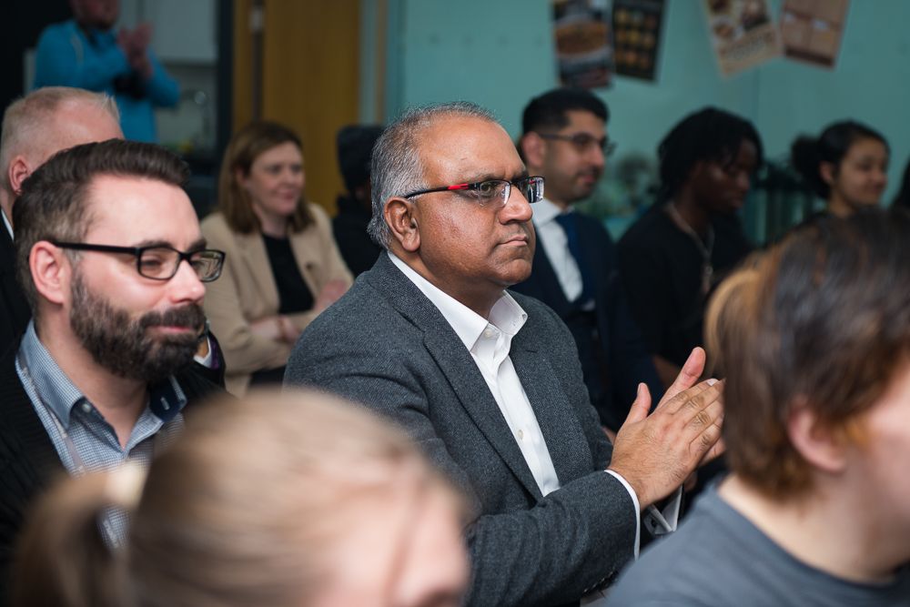 Safaraz Ali MBE listening at a community event
