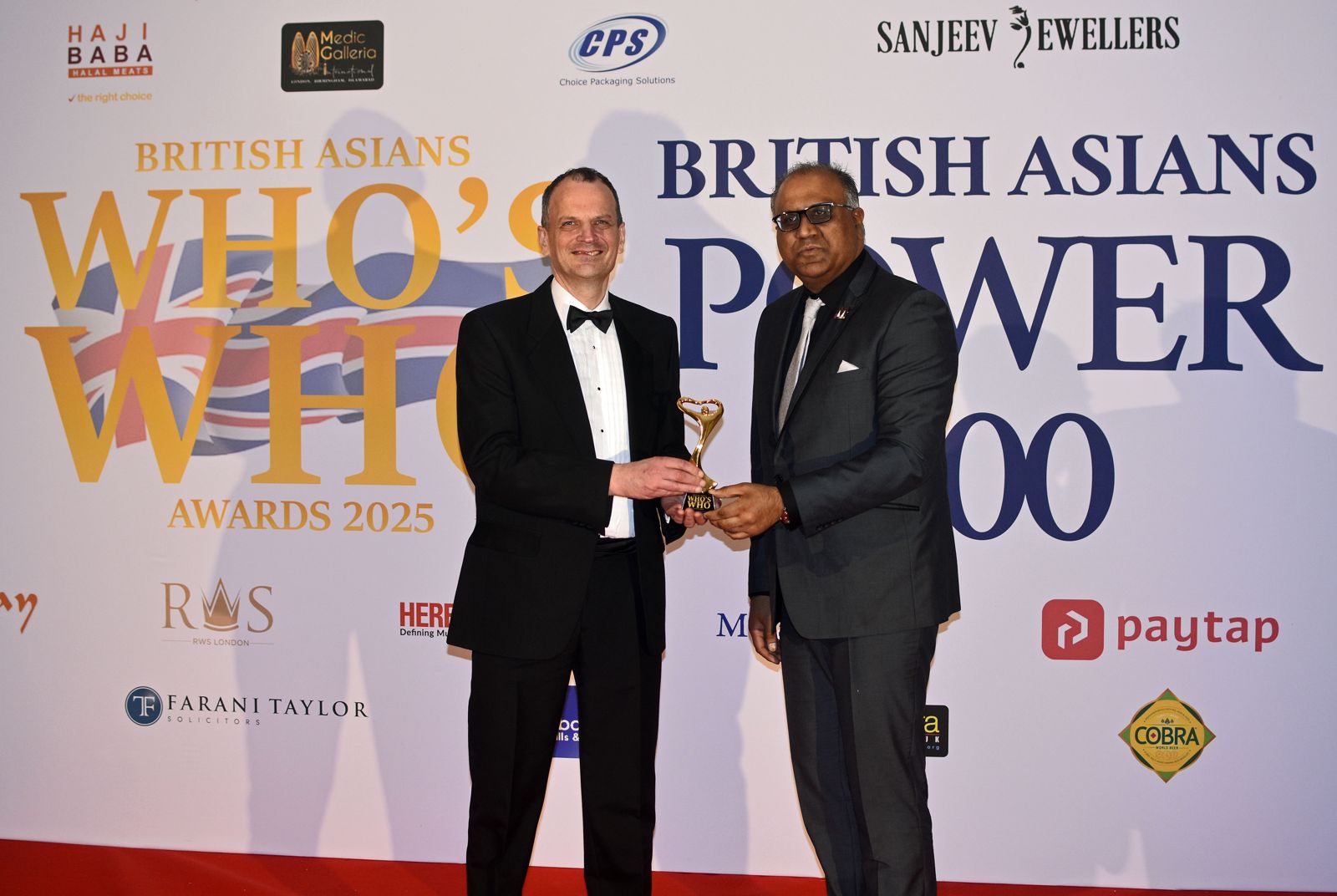 Safaraz Ali MBE receiving an award at the British Asians Who's Who awards
