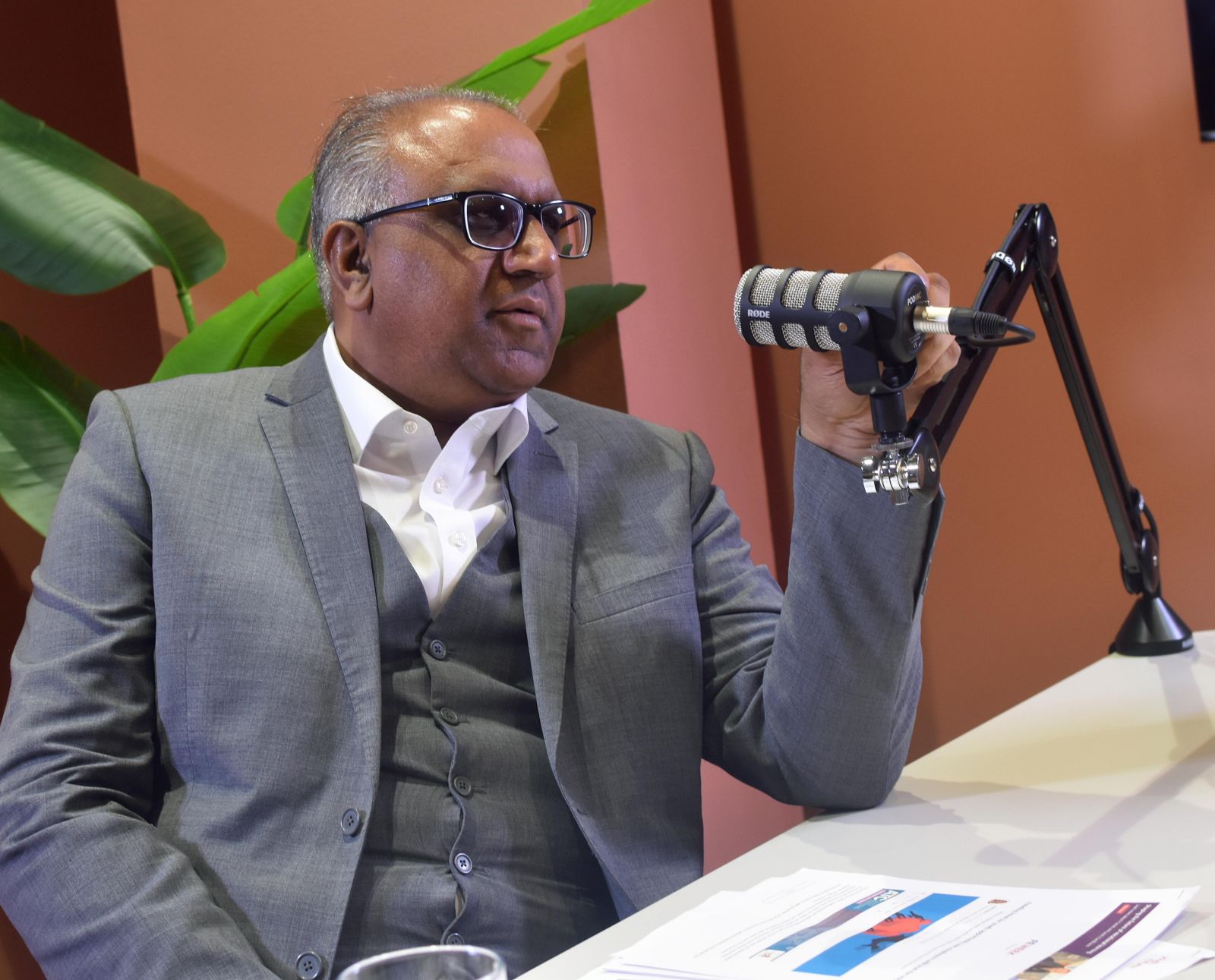 Safaraz Ali MBE recording a podcast