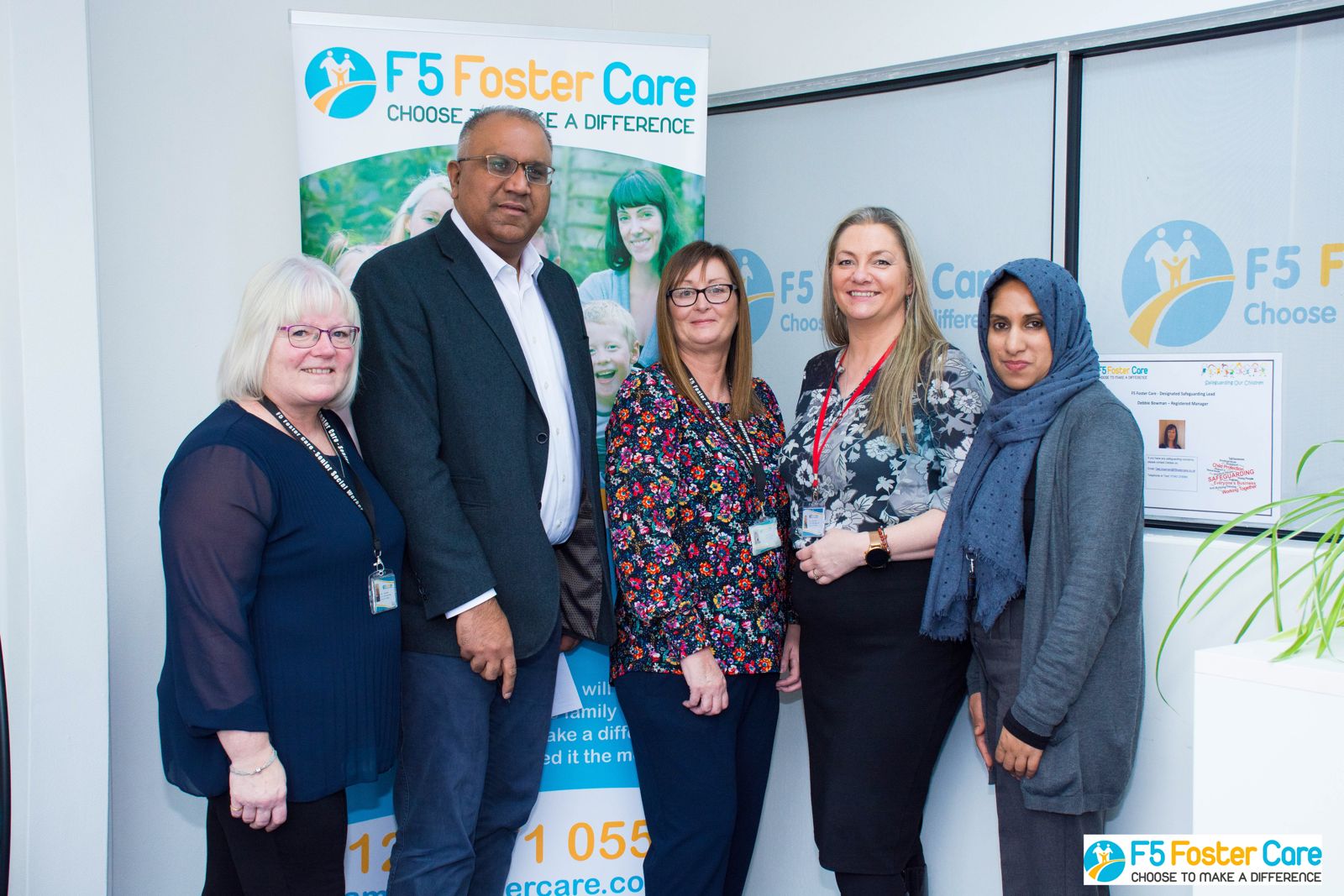 Safaraz Ali MBE with the team at a foster care agency office