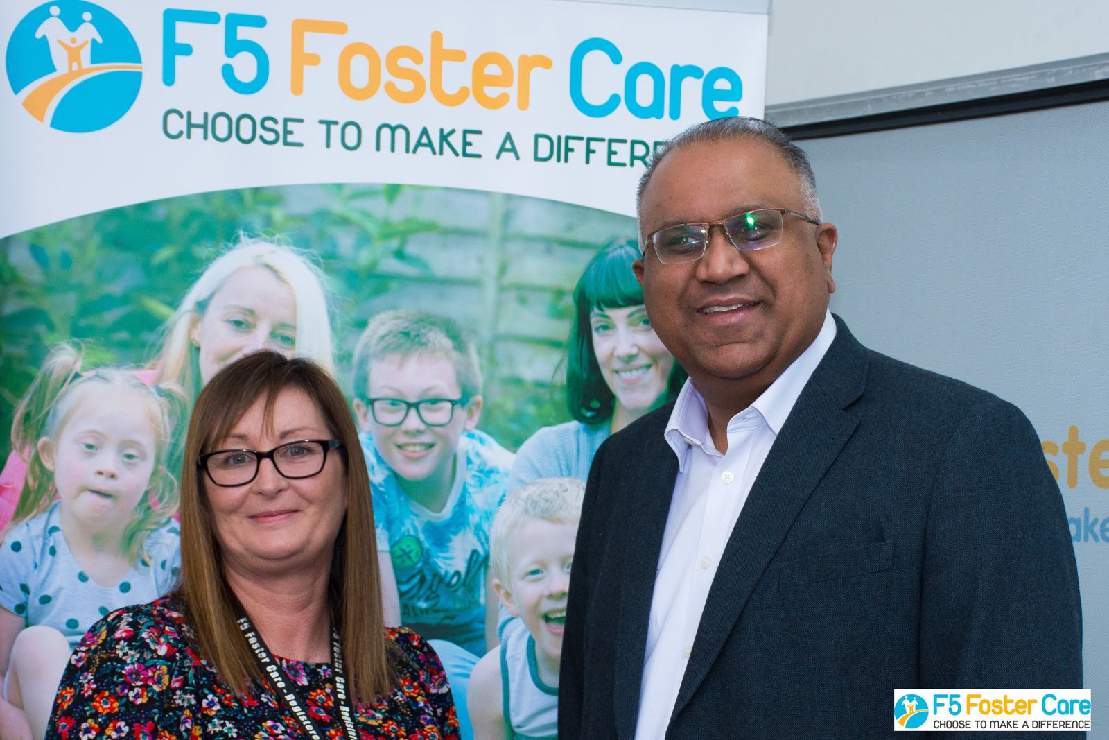 Safaraz Ali MBE with a foster care agency team member